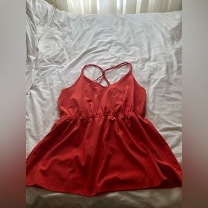 Gorgeous orange blouse crisscross in the back